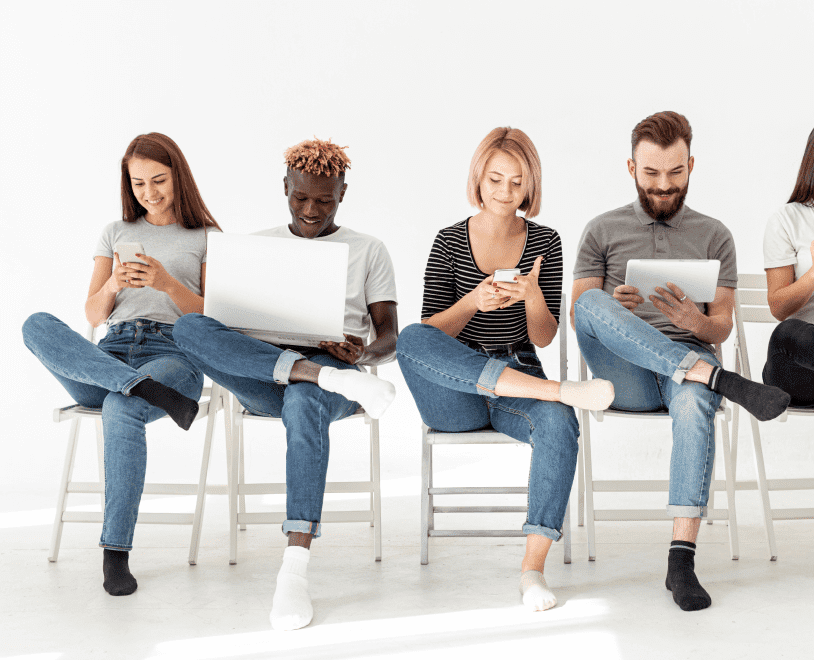 group-young-friends-sitting-chairs